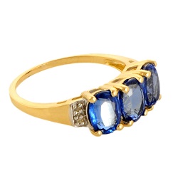 diamond ring in yellow gold with blue stones